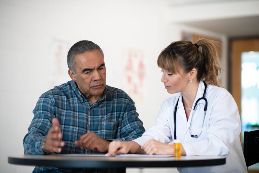 Patient talking to the doctor about colon cancer