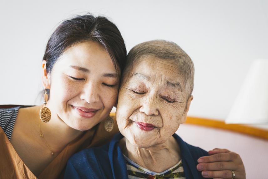 Two woman smiling